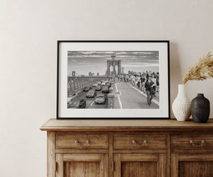 Iconic NYC bridge with cars and people