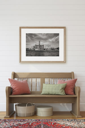 Monochrome Brooklyn cityscape with the Domino Sugar Plant and layered waterfront buildings.