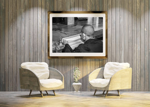 Young monk reading sacred texts – black and white photography
