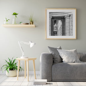 Curved stonework and decorative details frame a historic Argentine façade.