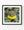Colour photograph of a bullfrog with a yellow throat among pond leaves.