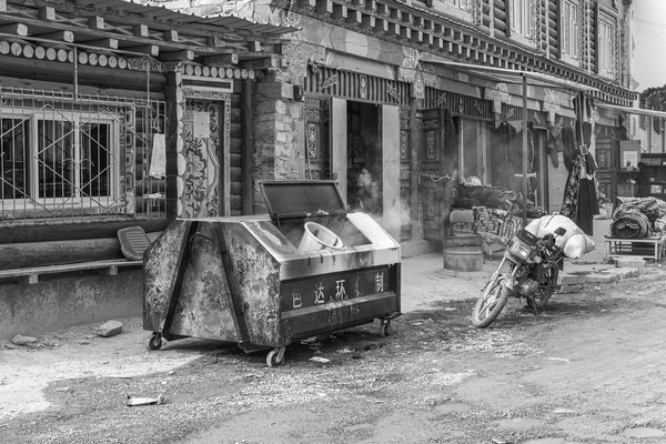 Chinese rural street scene with burning trash – black and white art