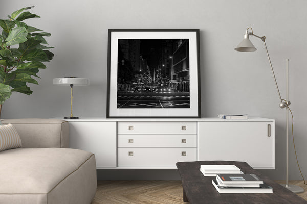 Black and white photo of Buenos Aires streets at night with Obelisk