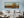 Panoramic Caddo Lake photograph with autumn trees and soft water reflections.