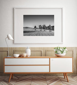 Fine art photo of camels in textured sand