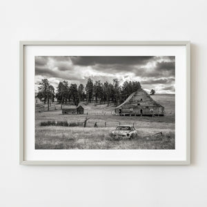 Black and white photograph of an abandoned farm near Hedley British Columbia