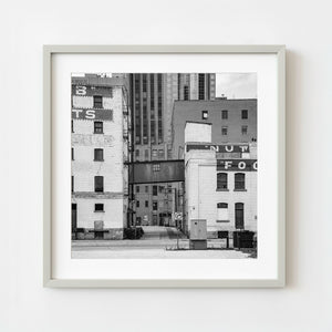 Black and white photo of historic industrial buildings in downtown Winnipeg