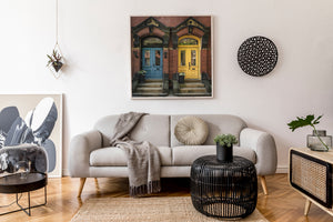 Symmetrical colorful doors on historic brick homes