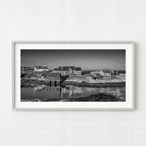 Black and white Peggys Cove harbor reflections