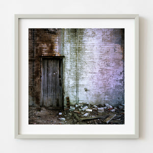 Weathered wooden door in abandoned brick building Haliburton Ontario