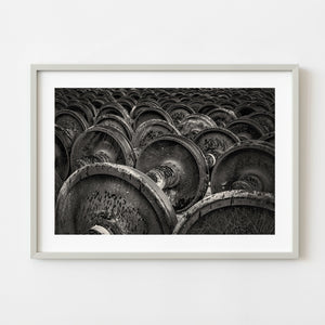monochrome rail car wheels stacked in industrial yard Hamilton Ontario