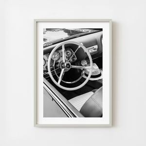 Classic car interior monochrome steering wheel and dashboard