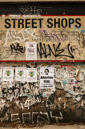 Urban poster wall with graffiti and torn paper textures