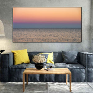 Soft orange and lavender dusk over lake