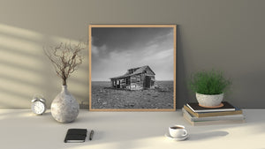 isolated abandoned building in Saskatchewan grassland monochrome