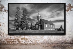 Old abandoned church with steeple on prairie landscape Canada