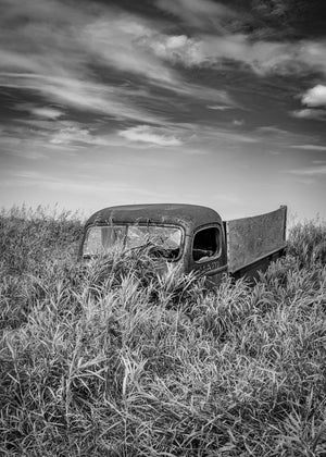 rusted old pickup truck in Saskatchewan field monochrome