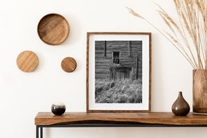 Rural abandoned grain elevator door and chute Canada