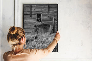 Black and white abandoned prairie farm grain elevator siding