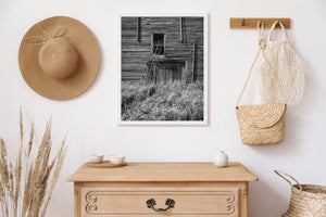 Prairie farm building exterior with unused loading ladder