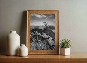 Close view of weathered tractor wheel with bolts and metal brackets