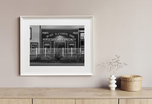 Weathered wooden storefront in Dawson City Yukon black and white photography