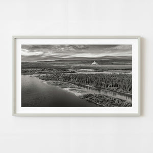 Black and white aerial view of Yukon River winding through forest valley