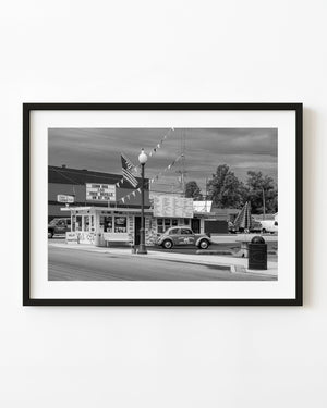 Black and white photograph of Carol’s Corner diner and a Volkswagen Burger Buggy in Indiana.