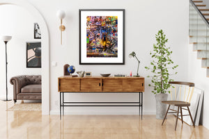 Layered stickers and graffiti wall artwork