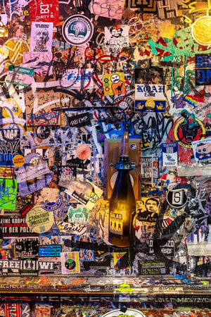 Street art sticker collage with wall texture