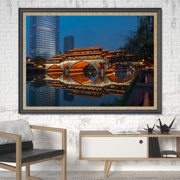 Serene river reflection of lit Chengdu bridge
