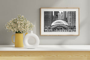 Cloud Gate sculpture reflecting urban Chicago architecture