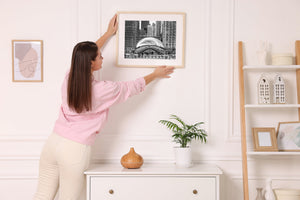 Chicago's iconic Bean sculpture with mirrored building facades