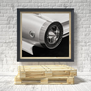 Sculptural rear design of 1959 Cadillac captured in monochrome