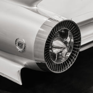 Chrome detail of vintage Cadillac rear quarter panel