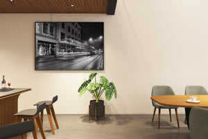 Urban wall art with moving tram