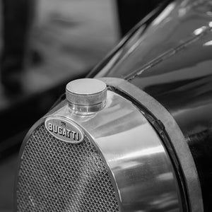 Classic car grille with vintage Bugatti emblem