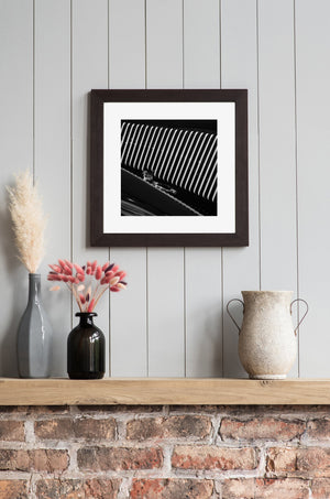 Detail of old car hood showing mechanical artistry