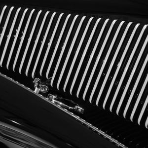 Black and white photo of classic hood detail
