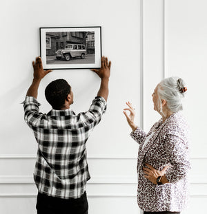Restored vintage Jeep parked in quiet suburban neighborhood