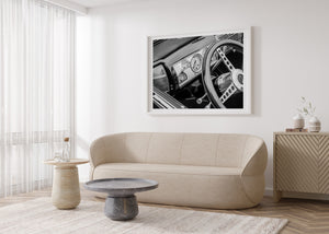 Black and white vintage car interior with polished chrome details