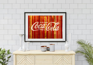 Vintage Coca-Cola sign on wood