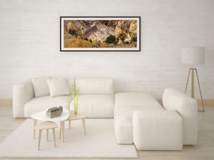 Warm rock walls surround a pale purple formation in this detailed desert landscape.