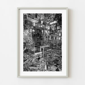 Black and white restaurant interior in Bogota with patterned tile floor