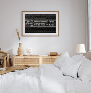 Urban railway platform with passengers and incoming train Netherlands