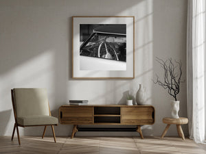 Classic Cord automobile interior with chrome details and a bright circular steering wheel.