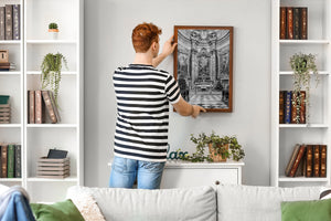 empty wooden pews leading toward richly decorated baroque sanctuary