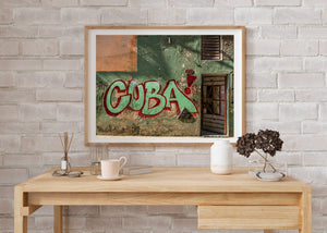 Colour street photograph showing CUBA graffiti, worn plaster and a dark metal door grille.