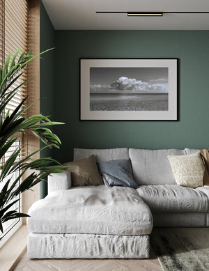 An open Cuban seascape combines a low horizon with sweeping clouds and quiet water.