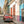 Classic Cuban car beside colorful colonial buildings